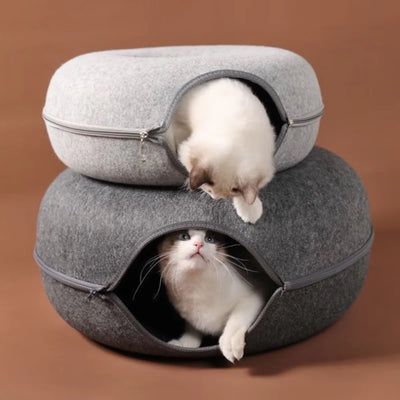 Cozy Cat Tunnel Bed featuring two cats peeking out of stylish, cozy, felted beds.